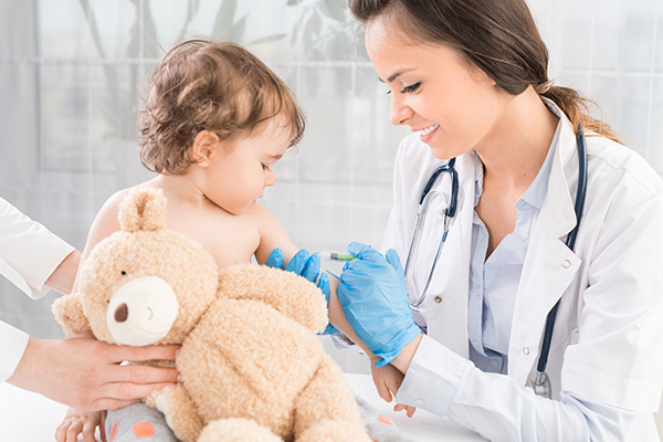 child being vaccinated